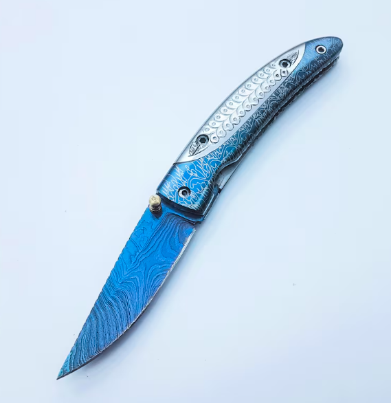 Handmade Folding Knife | Blue Titanium Damascus Blade | Hand-Carved Silver Handle |Box & Leather Sheath - Image 2